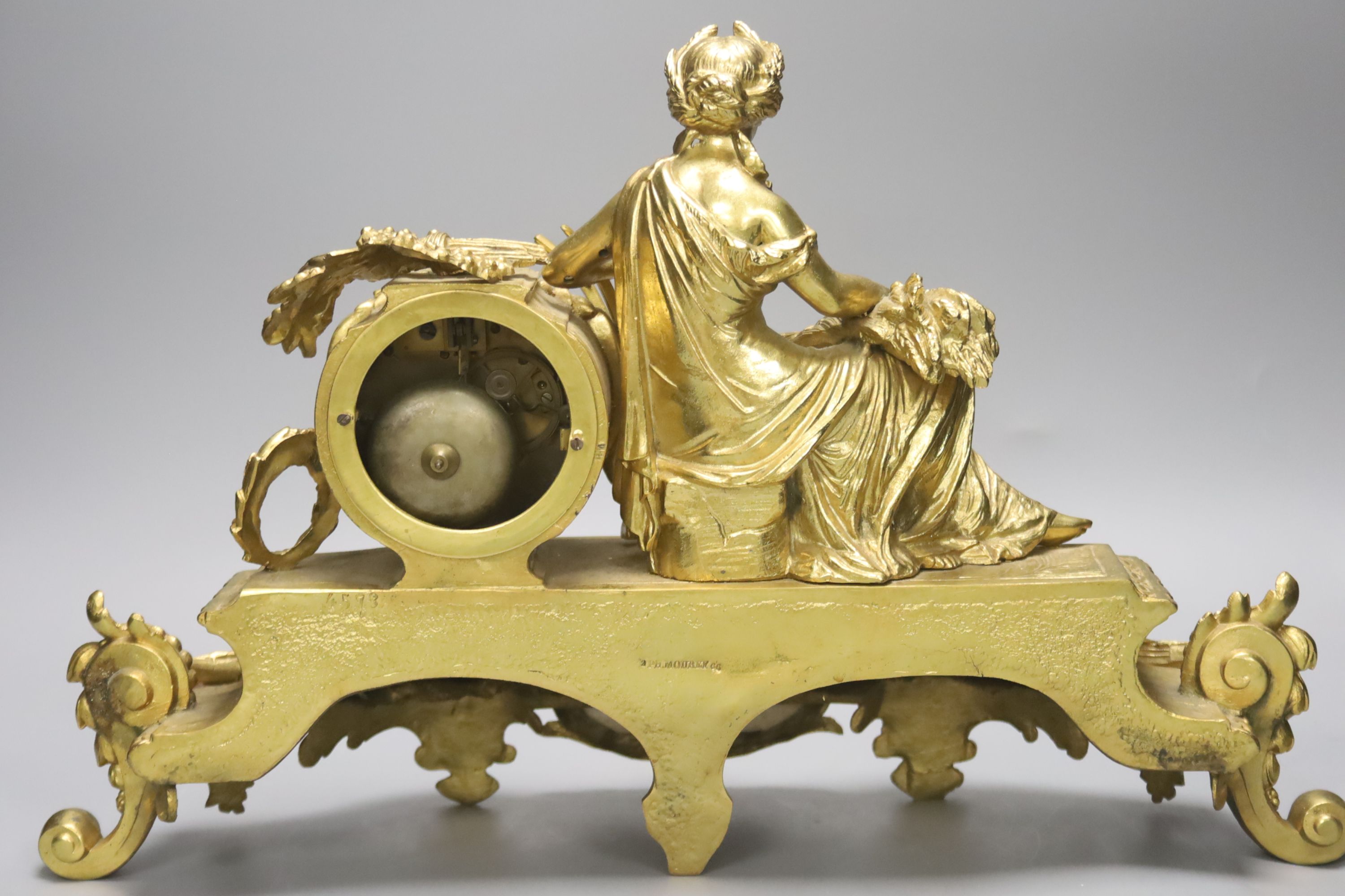 A late 19th century French gilt brass figural mantel clock, Sevres style plaques, length 47cm